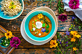 Moroccan lentil soup with edible flowers