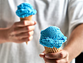 Smurf ice cream in a waffle cone