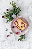 Slice of a pound cake with cranberry