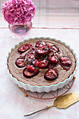 Hazelnut cocoa friand cake with roasted plums