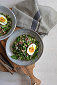 Green quinoa tabbouleh with radish and poached egg