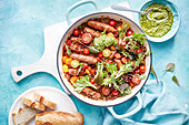 Braised Chipolata Sausages with Lentils and Basil Pesto Dressing