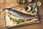 Salmon trout with herbs and lemons