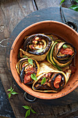 Zucchini and eggplant tian rolled