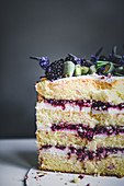 Vanilla sponge cake with blackberries and lavender