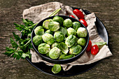 Brussels sprouts on wooden table