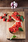 Toasted bread with tomatoes,garlic and herbs