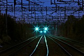 Signals on railway lines at night