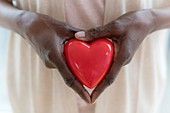 Woman holding heart shape