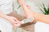 Woman having pedicure