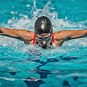 Woman swimming butterfly