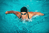 Woman swimming butterfly