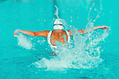 Woman swimming butterfly