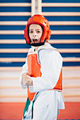Girl in taekwondo class