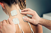 Placing TENS electrodes on neck