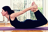 Yoga bow position