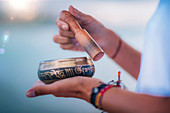 Woman with Tibetan singing bowl