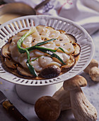 Scallops with porcini mushrooms and spring onions