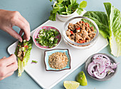 Preparing larb - Thai salad consisting of mutton, herbs and lots of good flavors