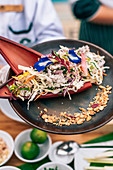 Thai fish salad in banana blossom