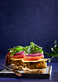 Chickpea and carrot burgers with vegan 'cheese'