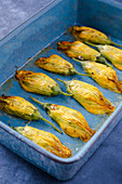 Zucchini flowers stuffed with ricotta, bacon and mushrooms