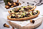 Onion baguette with chestnut mushrooms and almond cheese au gratin