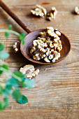 Walnuts in a wooden spoon