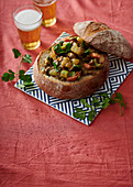 Lamb and coconut bunny chow