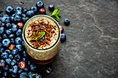 Blueberry chocolate milkshake in jar
