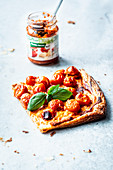 Puff pastry pizza with tomatoes