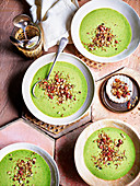 Pea, cider and mint soup with crispy bacon croutons