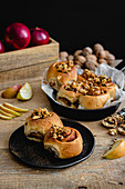 Cinnamon rolls with apple and walnuts