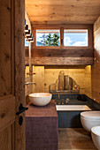 Small wooden bathroom in modern chalet