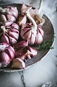 Close-up of a plate of pink garlic