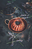 Mini Bundt cakes with blackberries and lavender