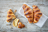 Puff pastry croissants on a wooden table