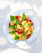 Semolina gnocchi with cherry tomatoes and basil