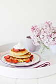 Pancakes with strawberries and cream