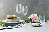 A table laid with a bouquet of flowers