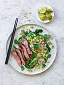 Asian beef salad with glass noodles and green vegetable