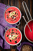 Beetroot cream soup with yogurt and smoked trout