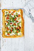 Simple goat's curd, olive and tomato tart