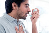 Man using inhaler