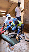 Draining a sewage pit in Senegal
