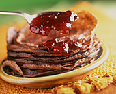 Stacked crepes with jam