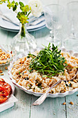 Risotto mit Pinienkernen, Parmesan und Rucola