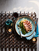 Lamb steaks with yeast butter and warm hummus