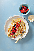 Crepes with vanilla cream cheese and berries