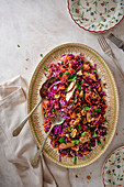 Red winter cabbage slaw with carrots, apple, dried apricots, walnuts and parsley